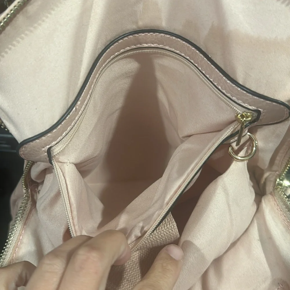 Blush perforated backpack
